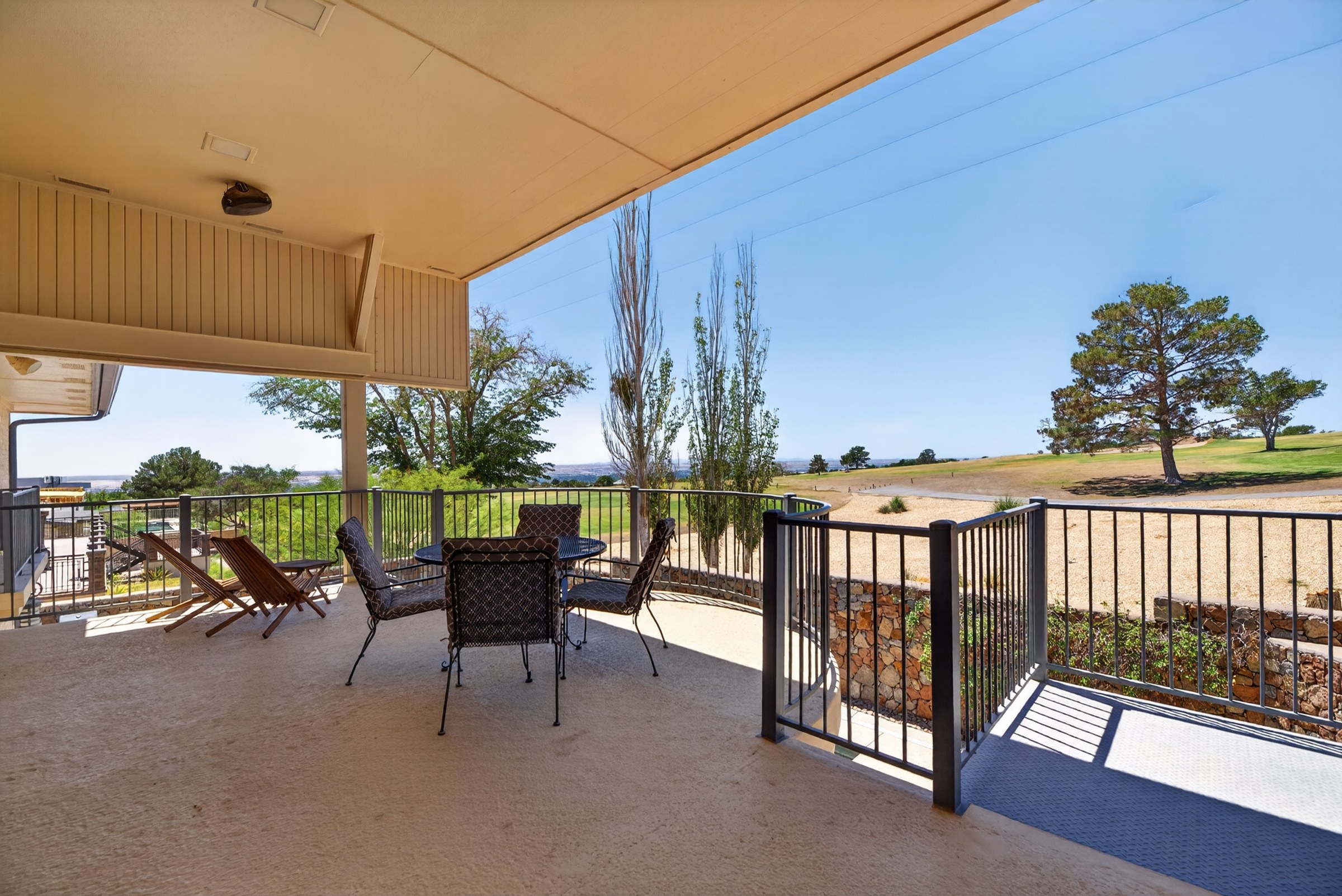 Covered terrace overlooking the Coronado Country Club golf course at 1013 Singing Hills Drive